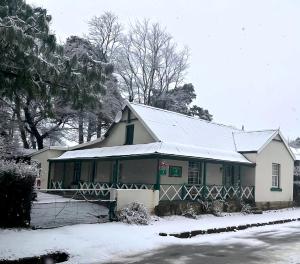 a house with snow on top of it at Rhodes ChrPetAli in Rhodes
