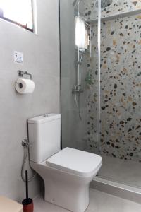 Koupelna v ubytování Limeri Apartments + 11 fotografií