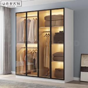 a wardrobe with glass doors in a room at Soul naz homes in Dar es Salaam +3 photos