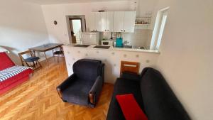 Posezení v ubytování Porto Novi, Djenovici + 28 fotografií
