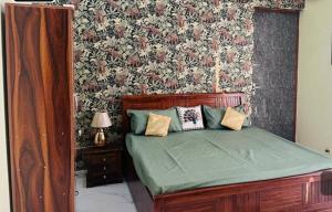 Postel nebo postele na pokoji v ubytování Vrindam Farm + 22 fotografií