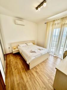 Postel nebo postele na pokoji v ubytování Villa Sun