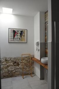 Koupelna v ubytování Yllen Rooms + 37 fotografií