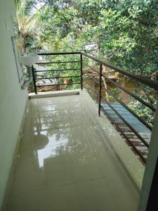 Un balcón o terraza en Aswathy Bhavan