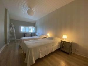 Posteľ alebo postele v izbe v ubytovaní Maison Belle Époque à Royan avec Terrasse, 200m Plage - FR-1-494-157