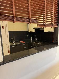 Η κουζίνα ή μικρή κουζίνα στο Nice Studio rabat +5 φωτογραφίες