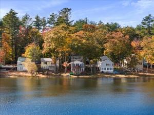 a group of houses on the shore of a lake at Waterfront w/ Prvt Dock & Firepit | Sleeps 8 in Acton
