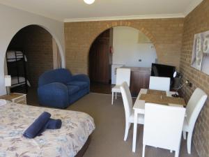 Χώρος καθιστικού στο Albury Classic Motor Inn