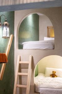 Postel nebo postele na pokoji v ubytování Riad 10 Mandarin BOUTIQUE RIAD