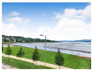 a view of a river with a street light at Brigadoon House Lochgilphead in Lochgilphead
