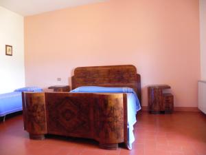 A bed or beds in a room at Agriturismo Poderi Minori