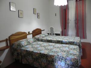 A bed or beds in a room at Agriturismo Poderi Minori