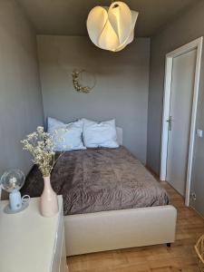 Postel nebo postele na pokoji v ubytování Apartement Strandhafer sea view