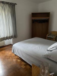 A bed or beds in a room at La casa di nonno carlo