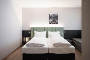 Postelja oz. postelje v sobi nastanitve Stadthotel Goldenes Schiff