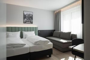 Postelja oz. postelje v sobi nastanitve Stadthotel Goldenes Schiff