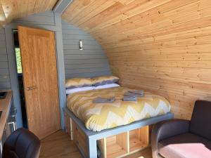 Postel nebo postele na pokoji v ubytování Ben View Pod