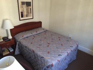 Cama o camas de una habitación en Hotel Harrington