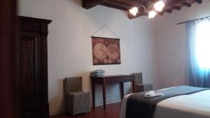 A bed or beds in a room at Agriturismo Poderi Minori