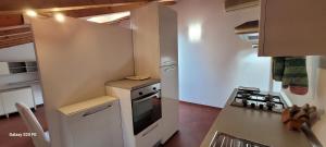 Cucina o angolo cottura di Relax a due passi dal castello