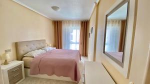 Postel nebo postele na pokoji v ubytování Beautiful Apartment near Playa de los Locos