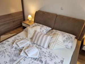 Postel nebo postele na pokoji v ubytování Apartments Manuel