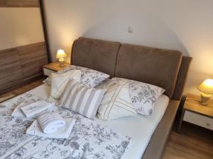 Postel nebo postele na pokoji v ubytování Apartments Manuel