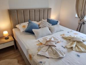 Postel nebo postele na pokoji v ubytování Apartments Manuel