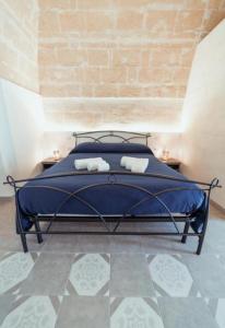 Postel nebo postele na pokoji v ubytování Villino Tortorelli