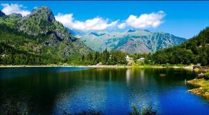 a view of a lake with mountains in the background at Ortensia casa vacanze in Antronapiana +22 photos