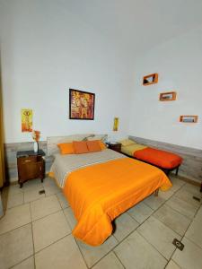 Postel nebo postele na pokoji v ubytování B&B Cappotto civico 48