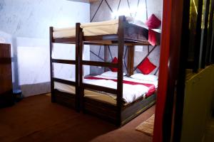 a couple of bunk beds in a room at The Escapee Resort in Mussoorie +8 photos