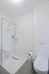Koupelna v ubytování Potaissa Hotel