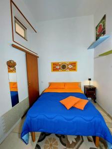 Postel nebo postele na pokoji v ubytování B&B Cappotto civico 48