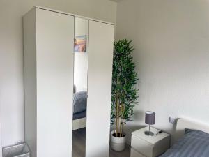 Postel nebo postele na pokoji v ubytování bookandstay24 Dietzenbach 2 Zimmerwohnung mit Balkon, Küche und Parkplatz-10