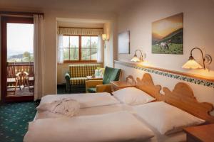Postel nebo postele na pokoji v ubytování Landhotel Spreitzhofer