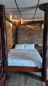 Postel nebo postele na pokoji v ubytování Củi Homestay Huế