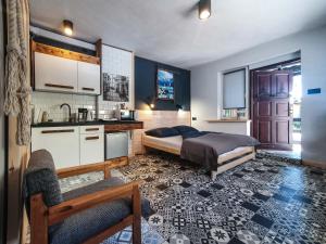 Η κουζίνα ή μικρή κουζίνα στο Apartamenty Mazurska 8a