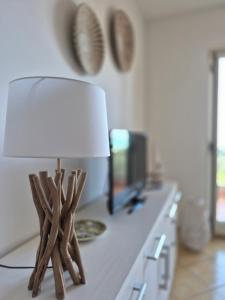 TV a/nebo společenská místnost v ubytování Casa Vacanze-Halivita + 37 fotografií