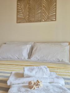 Postel nebo postele na pokoji v ubytování Casa Vacanze-Halivita