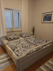 Ένα ή περισσότερα κρεβάτια σε δωμάτιο στο Apartment Monika