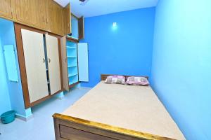Ліжко або ліжка в номері SHREE CHENDUR Residency, SUPRAPATH