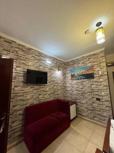 TV a/nebo společenská místnost v ubytování HOTEL RESTORANT LEZA