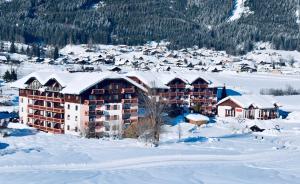 an aerial view of a resort in the snow at Gosau Apartment 202 in Gosau