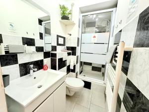 Koupelna v ubytování Saint Clair-Centre Port-WiFi-Climatisation + 32 fotografií