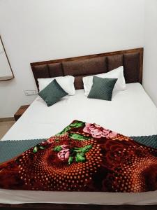 Postel nebo postele na pokoji v ubytování Hotel gora palace