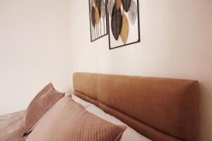 Postel nebo postele na pokoji v ubytování Villa Reve de Tirana