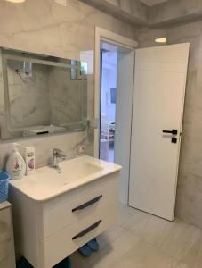 Koupelna v ubytování Apartamente Deon