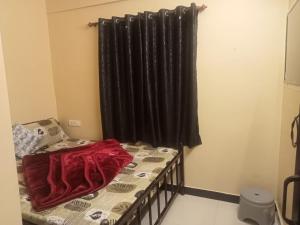 Postel nebo postele na pokoji v ubytování HRS Budget Rooms