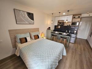 Kuchyň nebo kuchyňský kout v ubytování Opal-203 Condominio Confortable en Ecodistrito + 9 fotografií